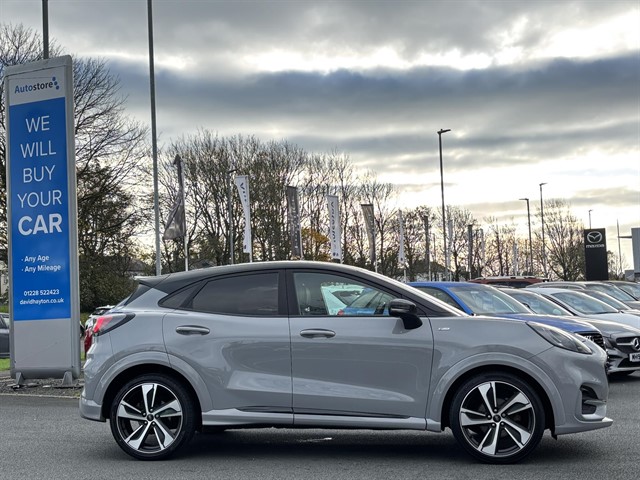 Grey car parked outside the David Heyton AutoStore